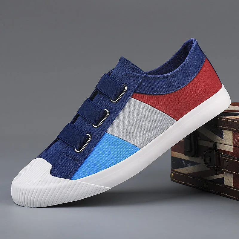 Men's low-top canvas sneakers with elastic band closure and flat rubber soles