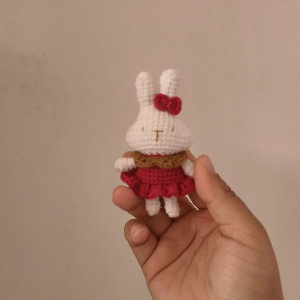 Hand-crocheted wool rabbit key chain with animal pendant design