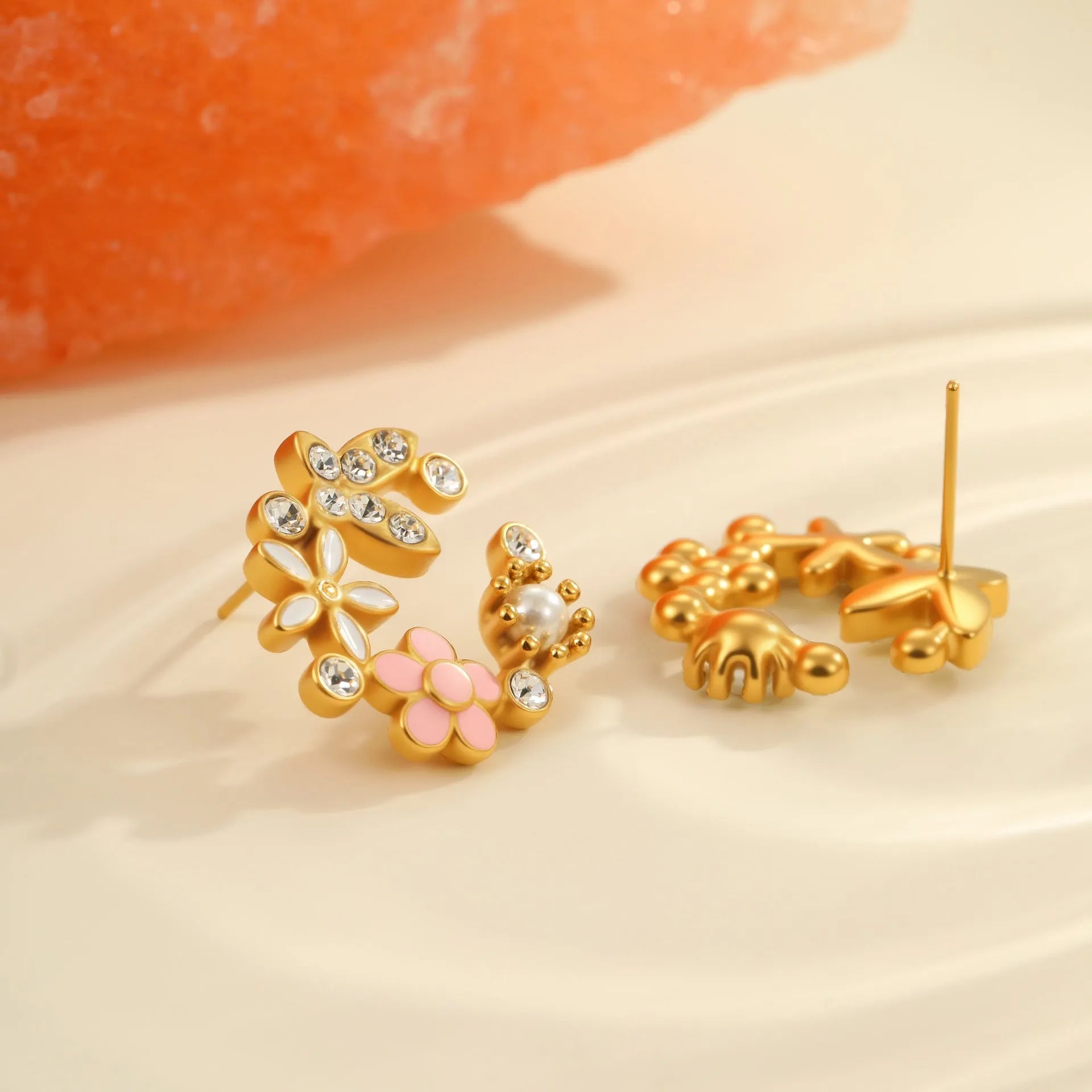 Flower stud earrings with colourful electroplated petals on gold-plated stainless steel