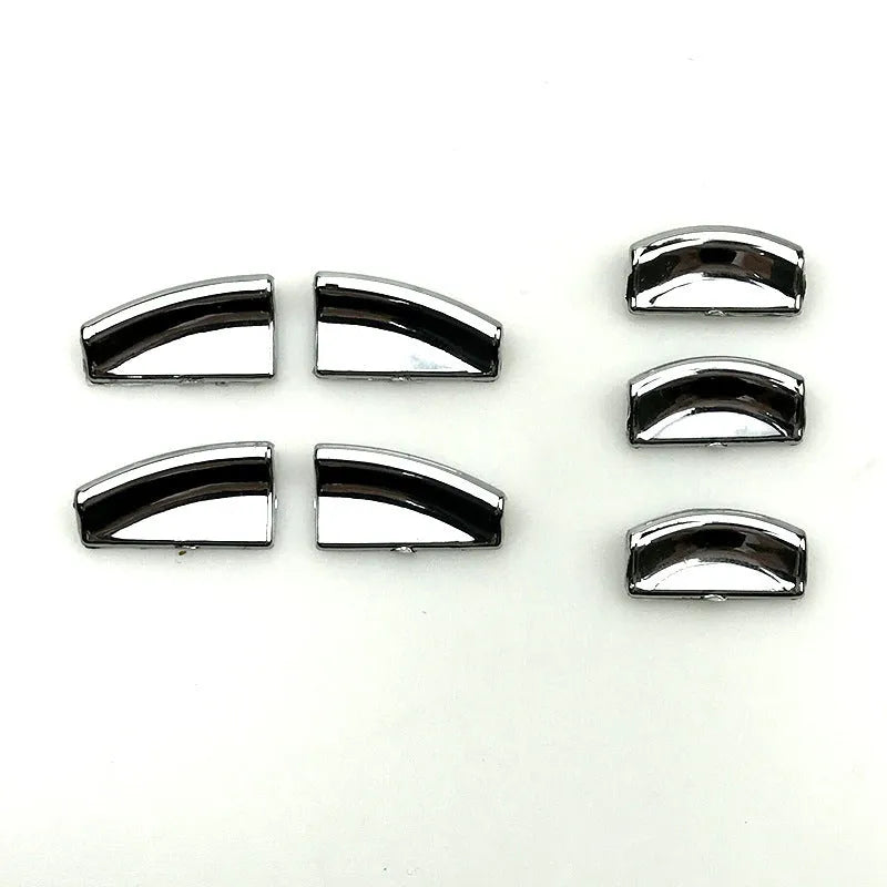 Black glitter decorative sticker for a car window lift button on a white background.