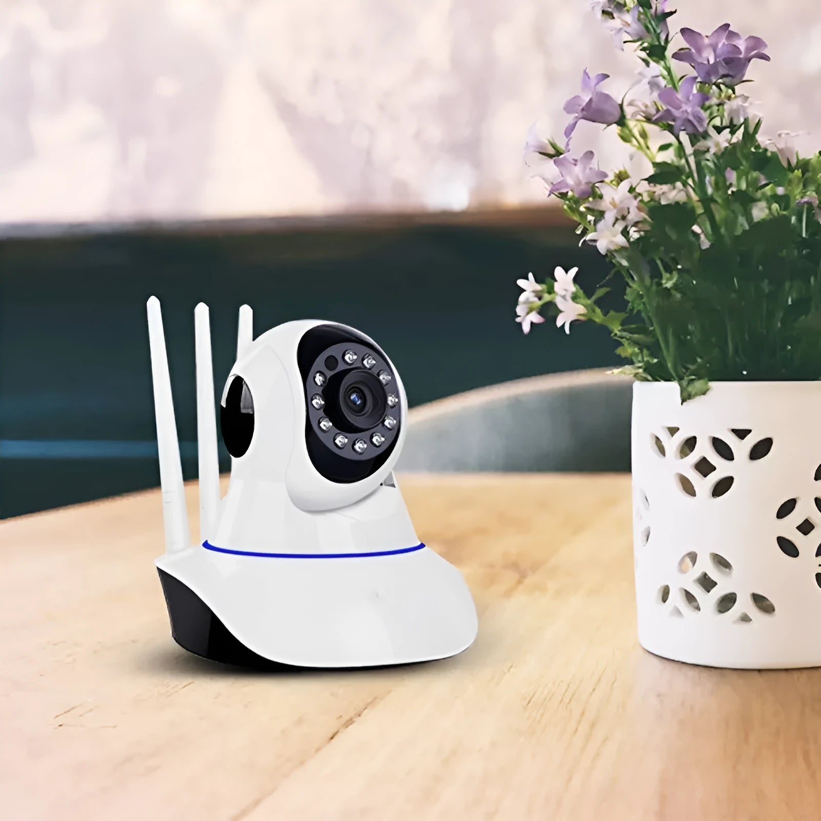 White wireless dome security camera on a stand showing the lens and housing.