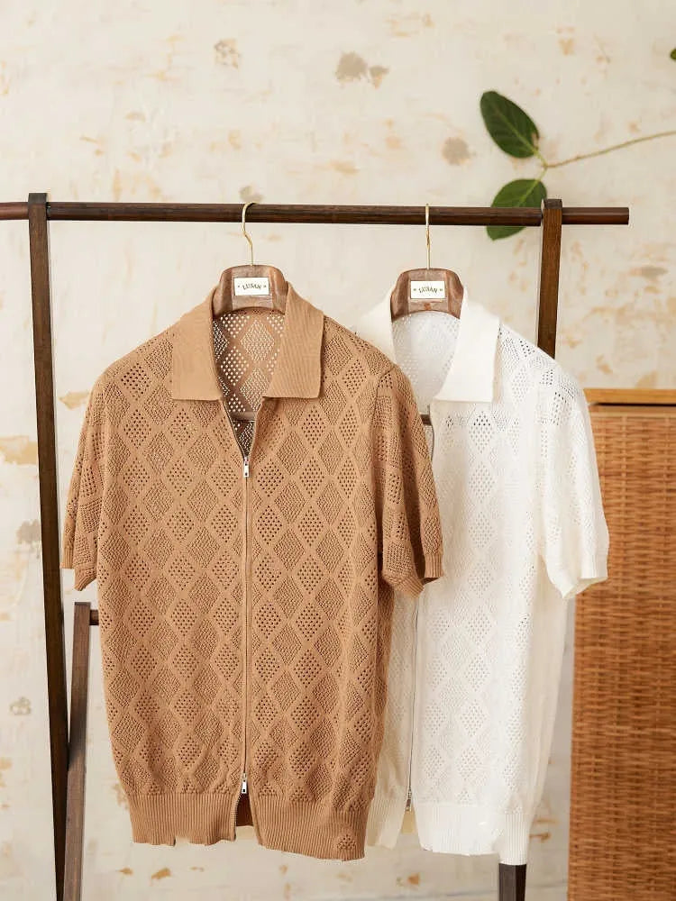 Light brown cotton zip-front cardigan with short sleeves and a lapel collar on a hanger.