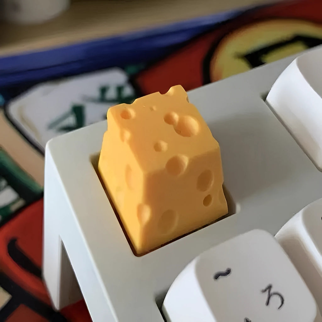 Yellow resin cheese keycap for mechanical keyboards with 3D design detail