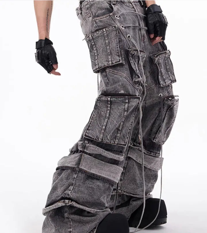 Grey denim distressed overalls with rope stitching and mop pants design