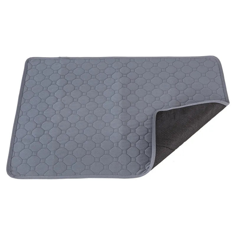Grey and tan washable dog pee pads measuring 18x24 inches with waterproof backing