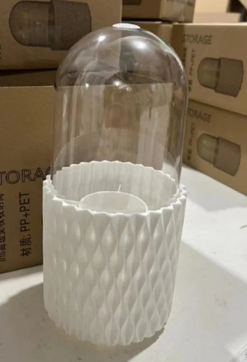White rotating transparent acrylic makeup brush holder with dust-proof lid on desktop