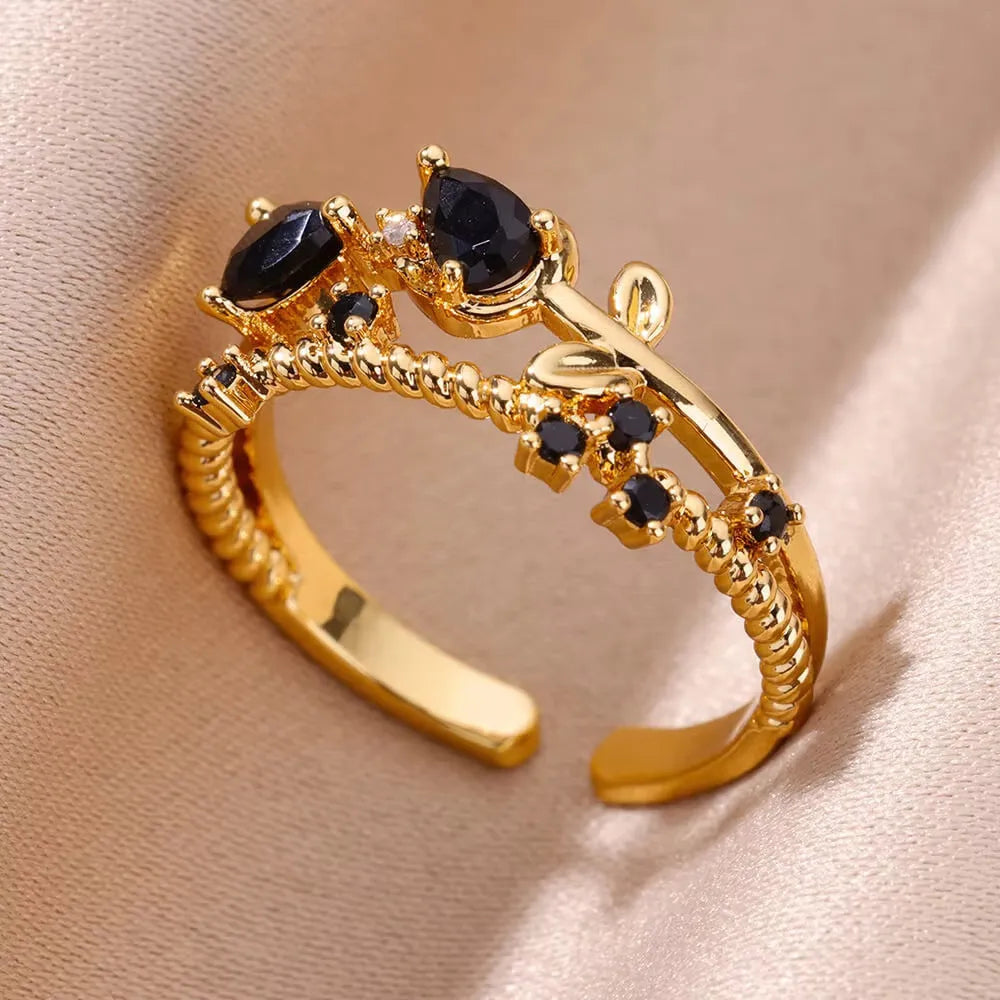 18K gold plated copper open mouth ring with synthetic zircon love emerald motif on white background