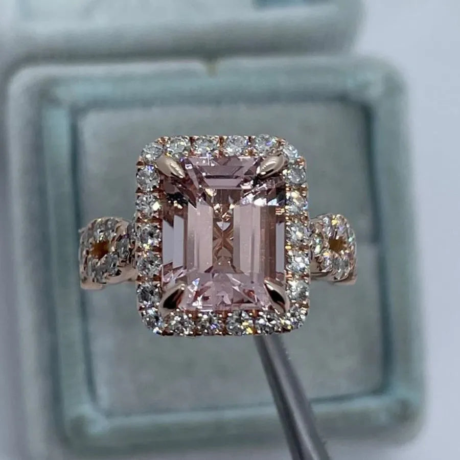Women's rose gold electroplated alloy geometric ring shown in seven available sizes