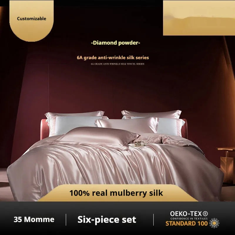 Silk four-piece bed set in a solid colour showing duvet cover and matching pillowcases.