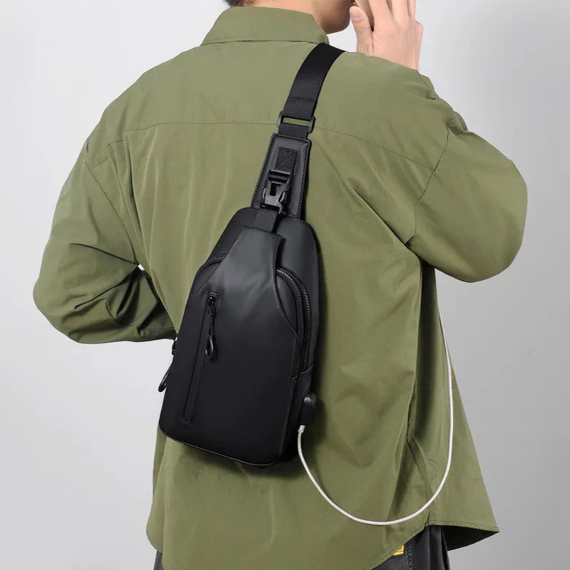 Black sling crossbody backpack for men with zipper and polyester lining, vertical square shape, solid colour design