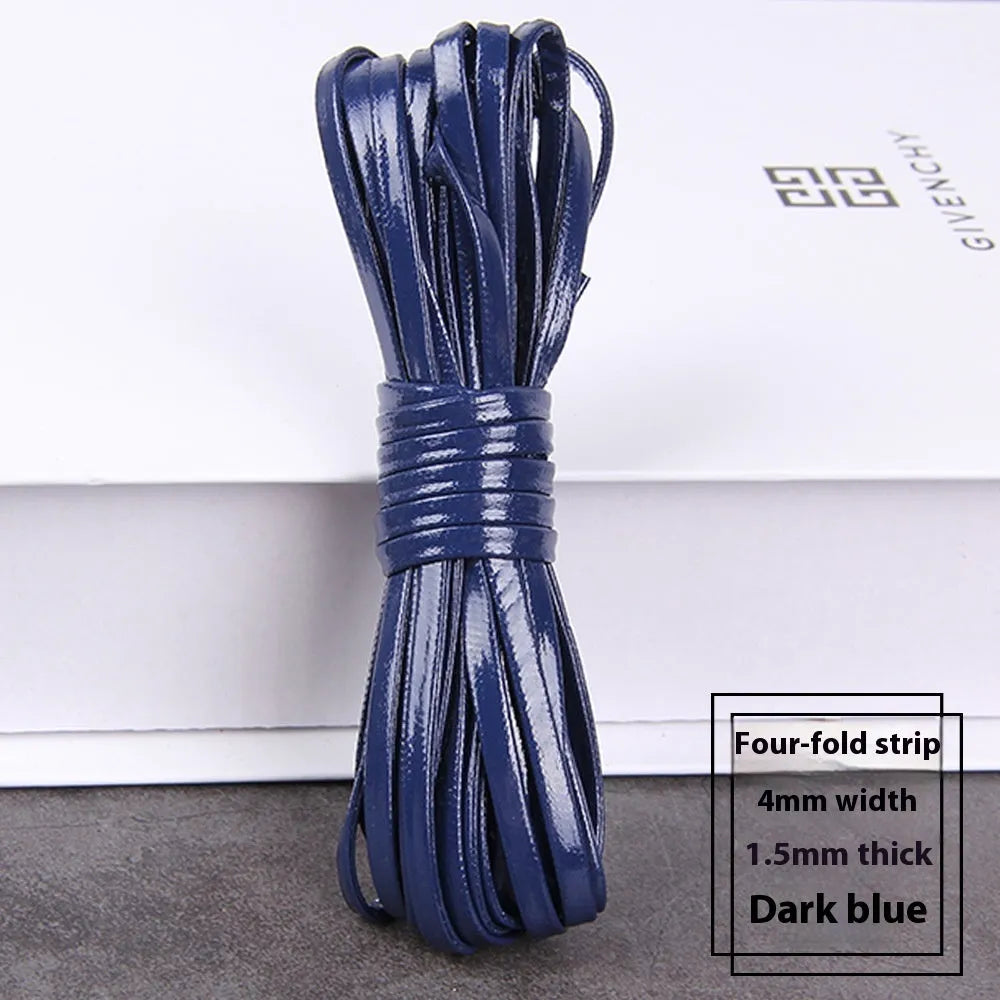 Coils of woven PU leather craft cord in various colours including black, brown, blue, red, and gold.