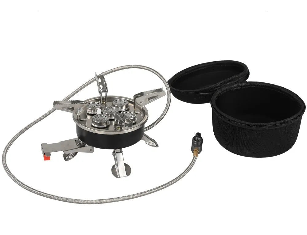Silver portable split camping stove with folded legs and a 100cm gas hose on a wooden table.