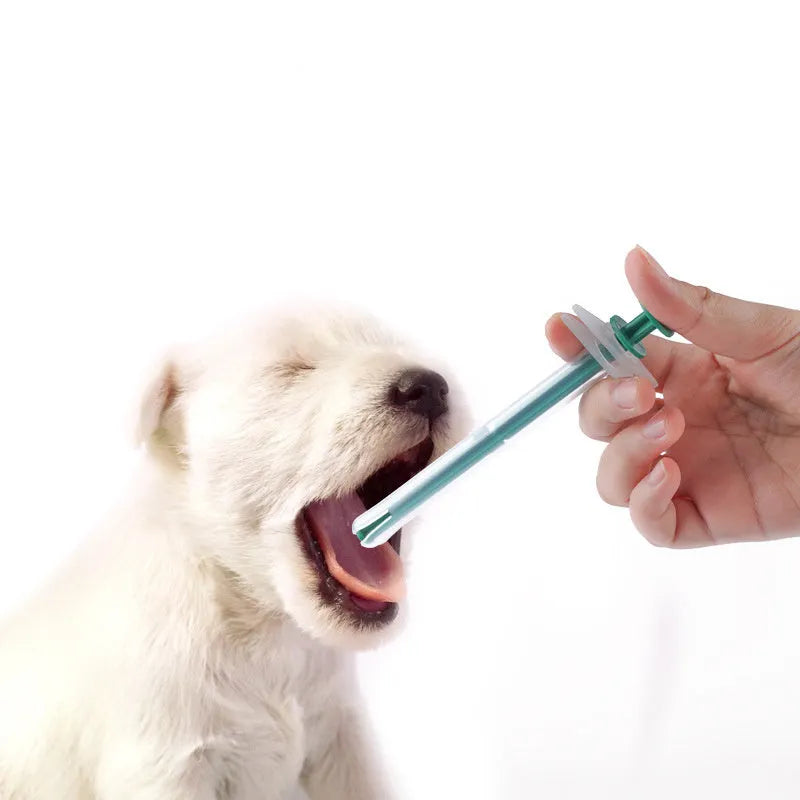 Two silicone gel pet pill shooter guns with soft tips for cats and dogs