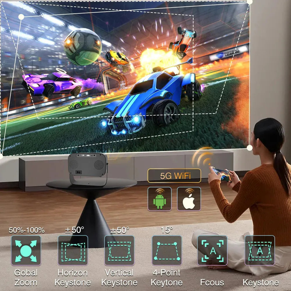 Black portable smart HD projector with remote control on a desk.