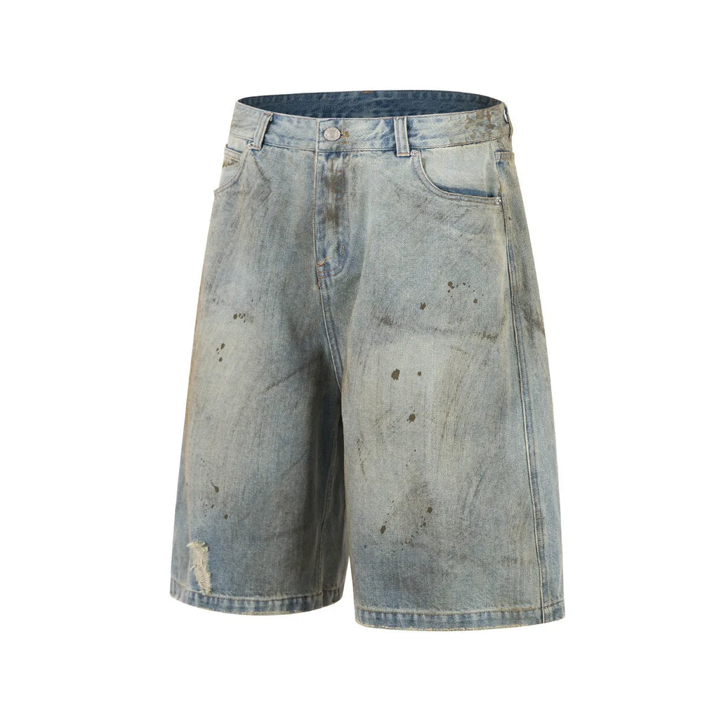 Blue cropped washed denim middle pants with a straight leg and zipper fly on a model.