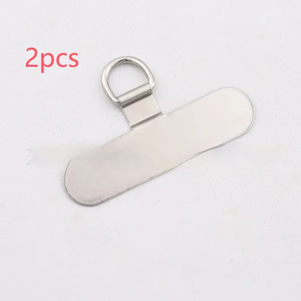 Stainless steel phone clip charging port fixing pad in 304 steel, black colour, on a phone mount