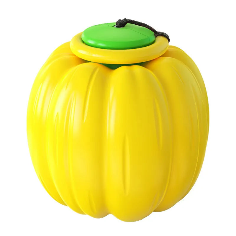 Green, orange, and yellow plastic pumpkin-shaped dog chew toy with squeaker.