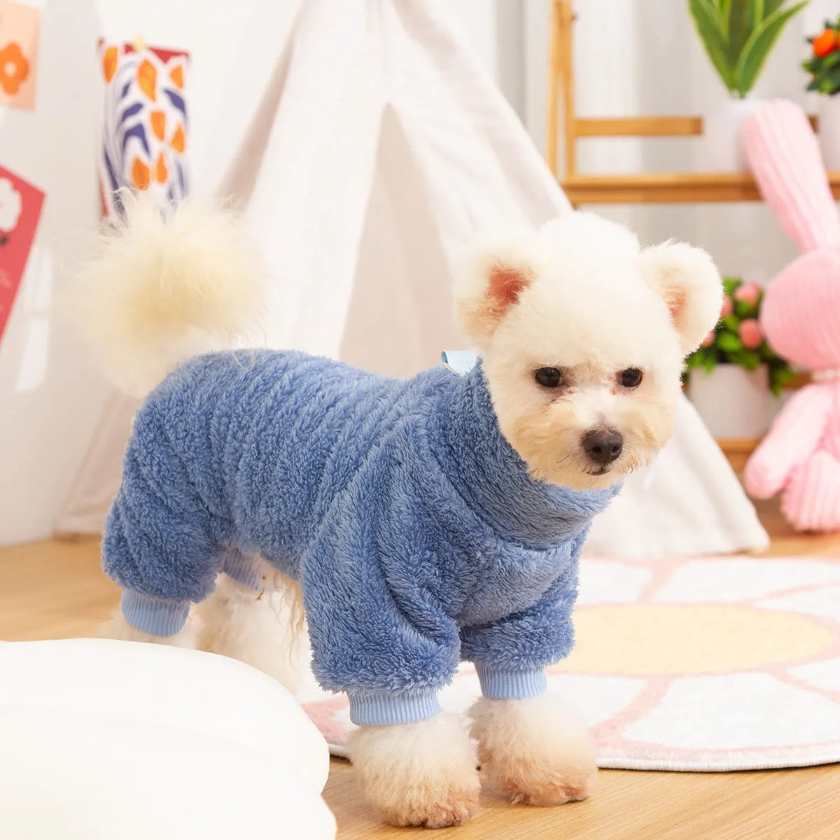 Four-legged dog clothing in thick plush fleece with high collar and towing ring in blue colour