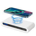White desktop wireless charger with atmospheric lighting and phone charging on surface