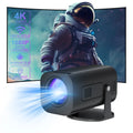 Black or white portable mini projector with remote control showing mobile phone connectivity