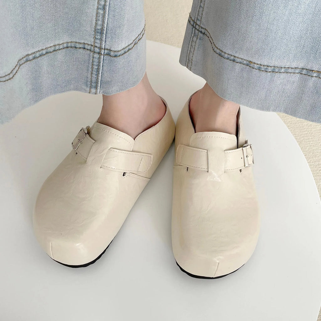 Flat buckle casual sneakers in yellow colour with round toe and PU upper material