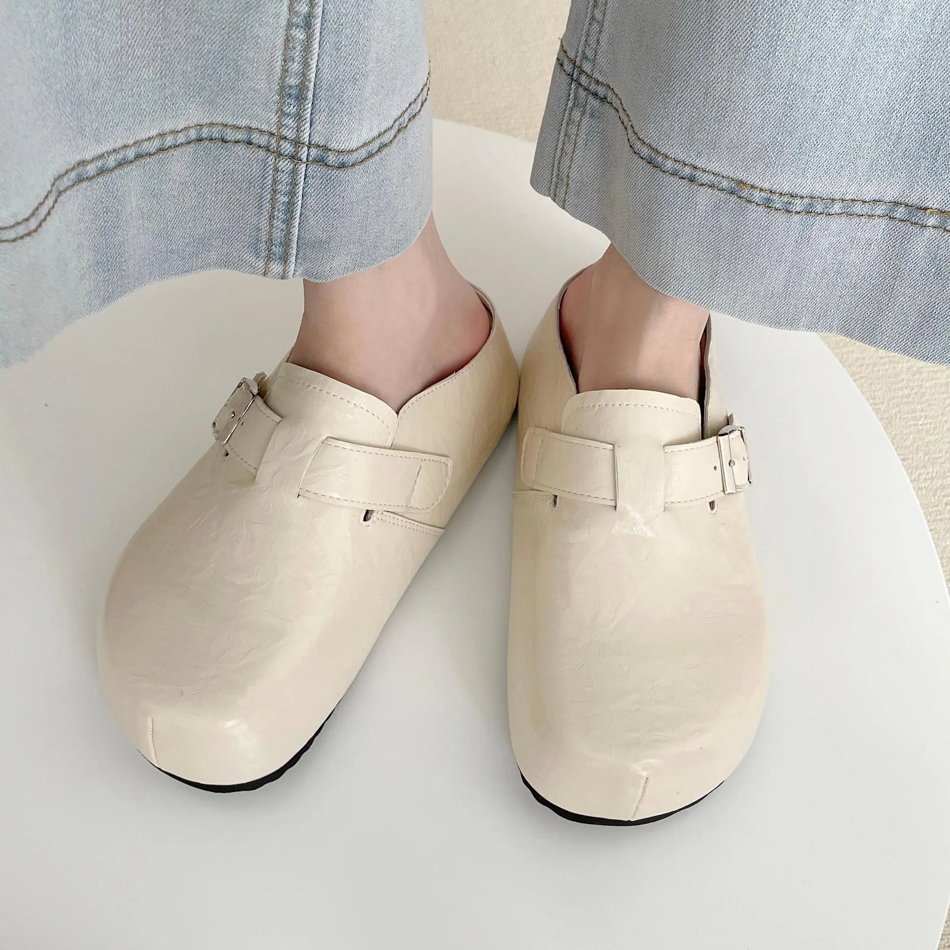 Flat buckle casual sneakers in yellow colour with round toe and PU upper material