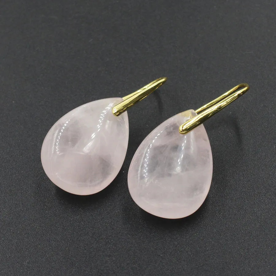 Geometric water drop earrings featuring a green aventurine crystal in a silver-toned electroplated setting.