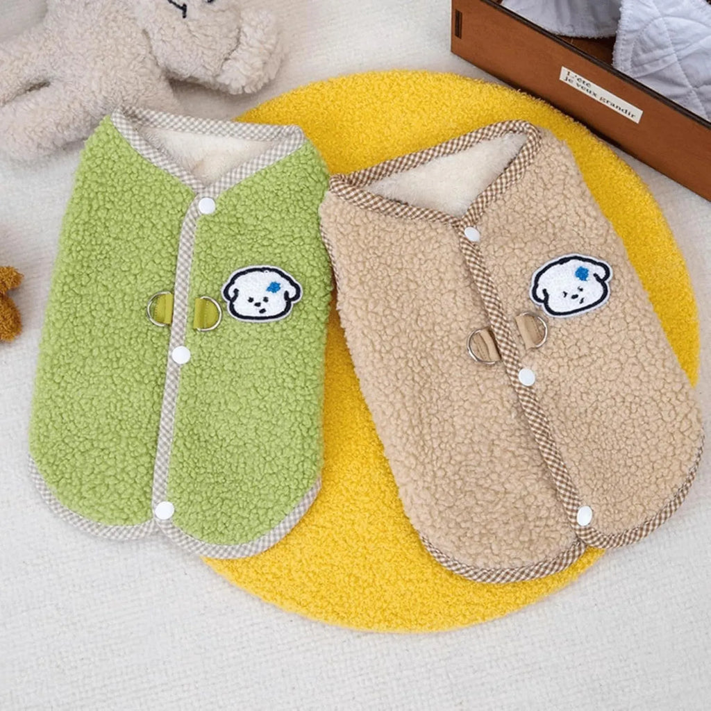 Green thickened coral fleece dog vest with a metal leash ring on a small dog.