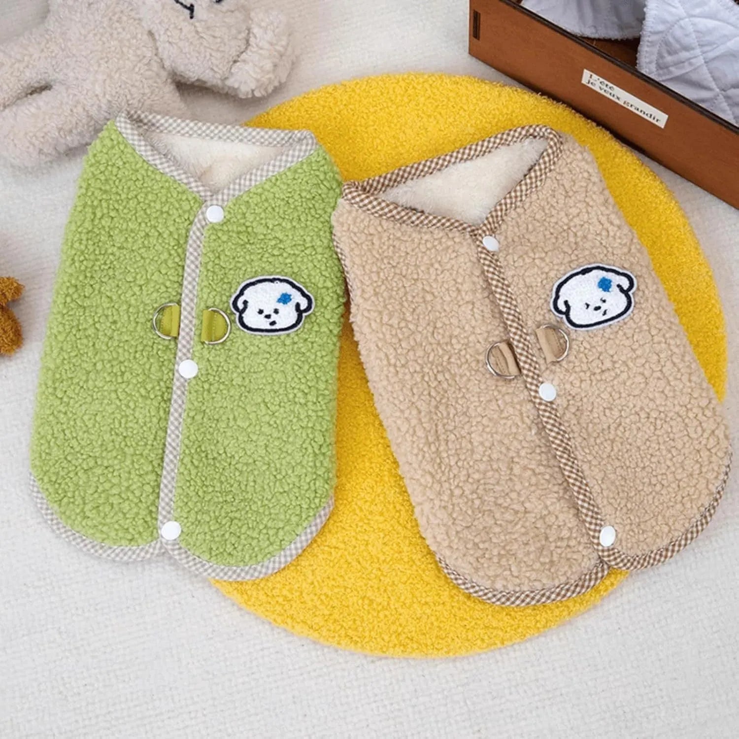 Green thickened coral fleece dog vest with a metal leash ring on a small dog.