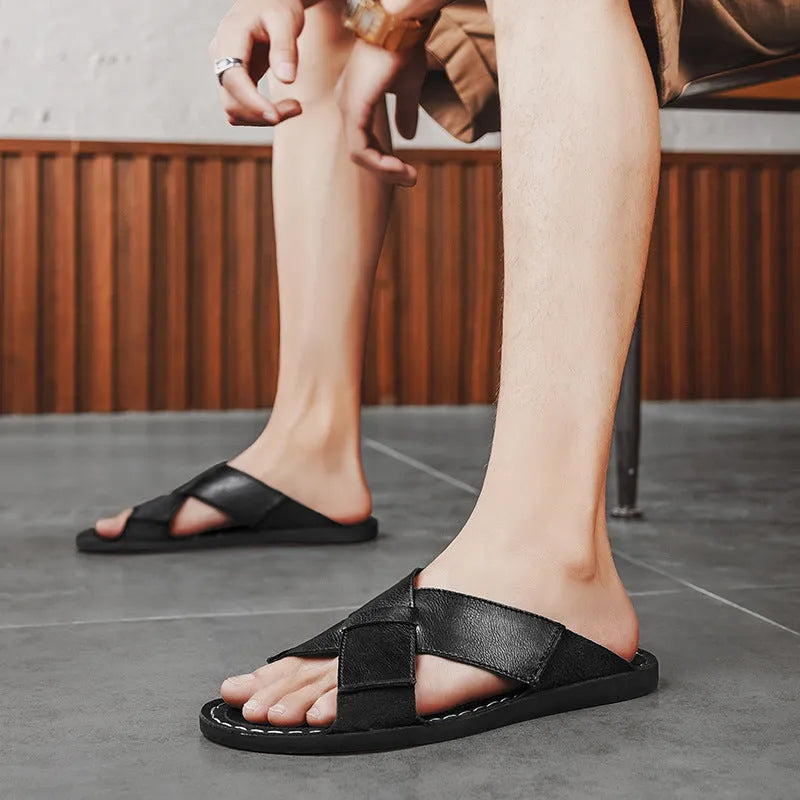 Men's black casual leather slip-on sandals with frosted pigskin upper and sewn rubber sole.