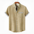 Loose-fit linen short-sleeved shirt with an ocean fish pattern on the lapel.