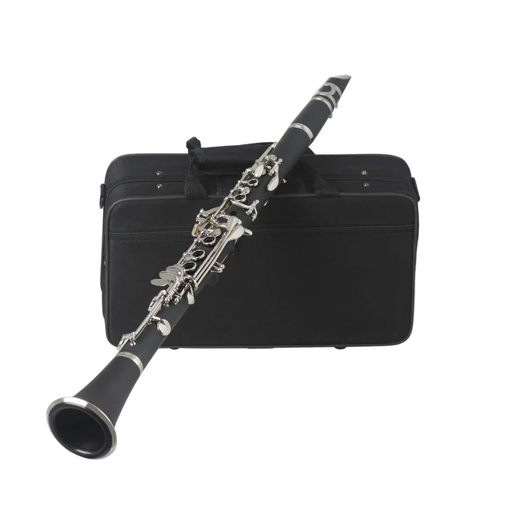 Black beginner B-flat clarinet with 17 nickel keys and a Bakelite body next to its carrying bag.