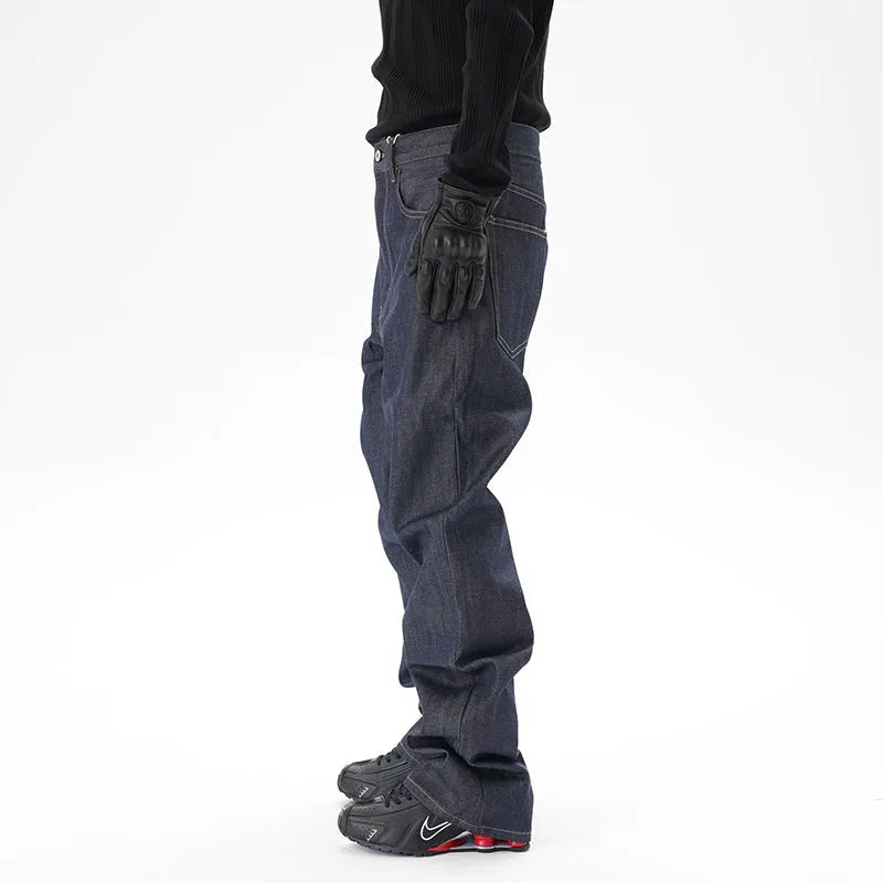 Man's dark blue loose straight-leg casual jeans on a white background.