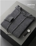 Men's dark grey cashmere hoodie and matching trousers laid out as a complete casual set.