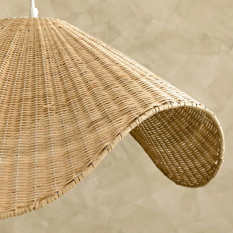 Handmade natural rattan and willow pendant chandelier with warm LED light.