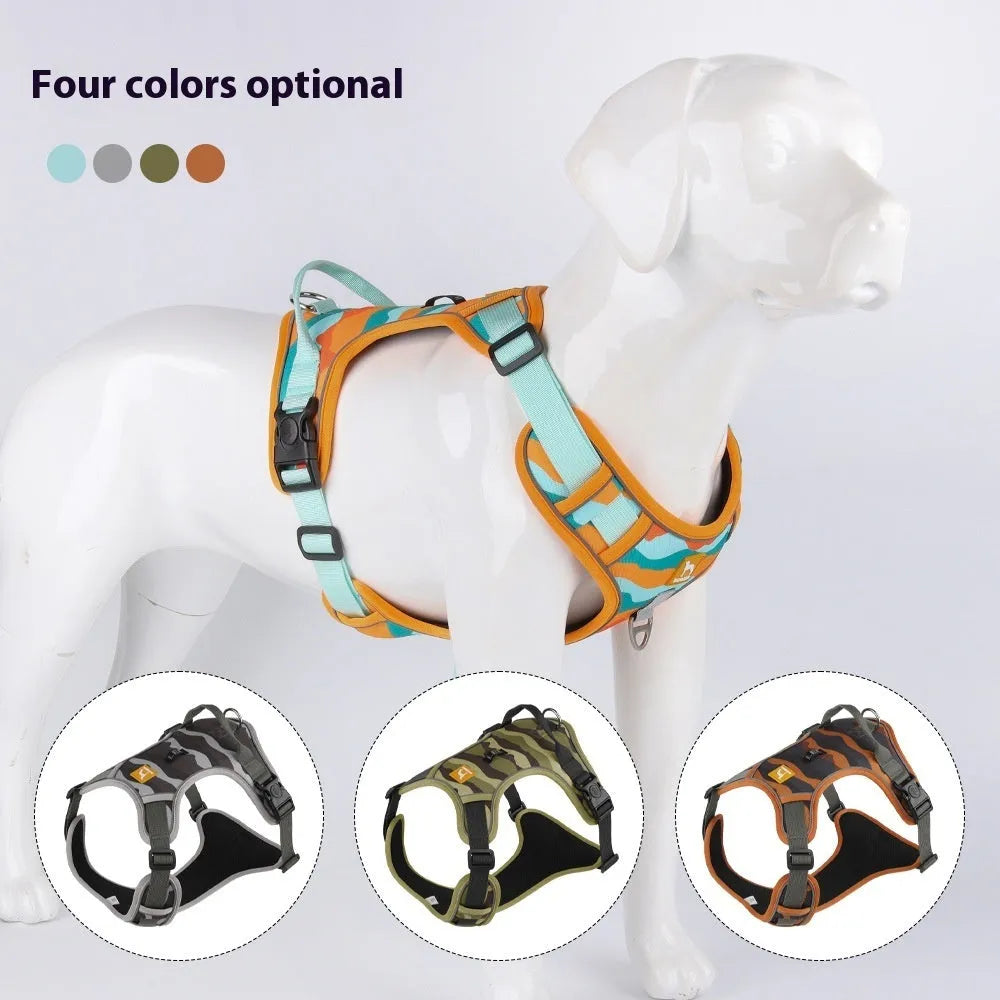 Reflective orange dog harness with chest and back rope attachments and a hand-holding lead.