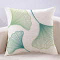 Ginkgo leaf printed square cushion cover on a sofa, available in multiple colours and sizes