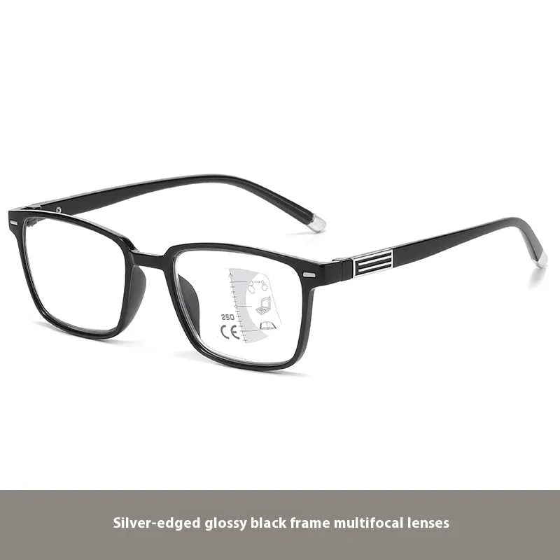 Multifocal blue light reading glasses with photochromic lenses in a black and silver frame style.