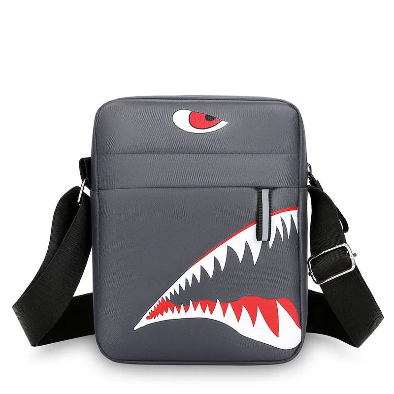Men's black Oxford cloth crossbody bag with animal print pattern and shoulder strap.