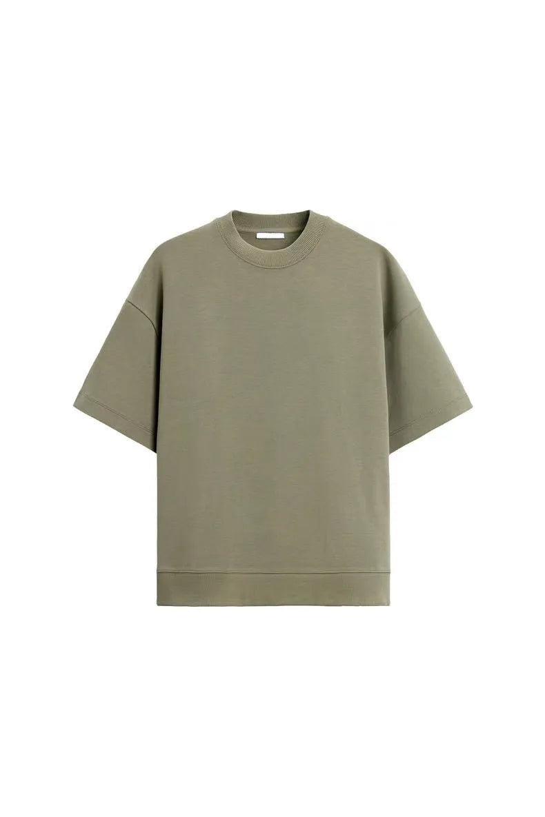 Loose fit short sleeve casual top with double-sided texture in blue, shown with a round collar.