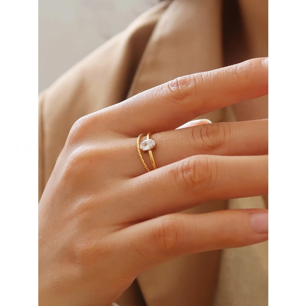 Simple golden electroplated stainless steel heart ring for women, shown in UK sizes 6, 7, 8.