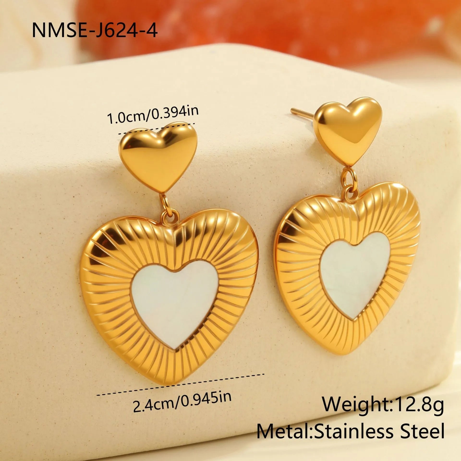 Gold-colour electroplated heart earrings with fritillary detail on stainless steel