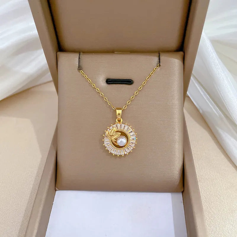 Women's titanium steel necklace and earrings set with square diamond ring pendant and leaf design.