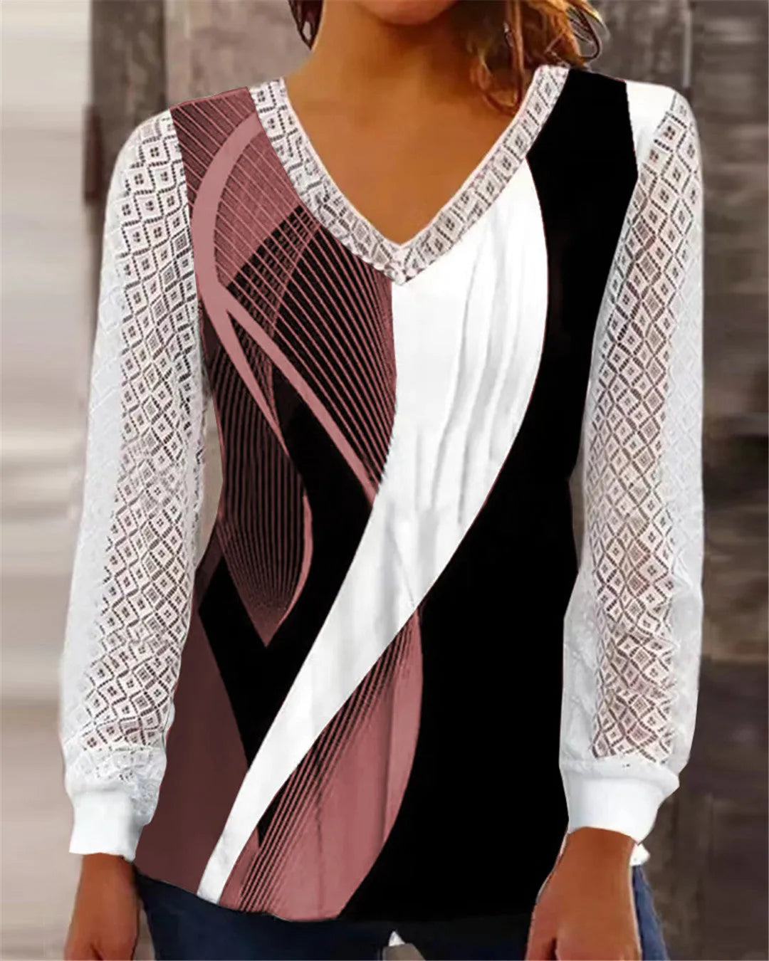 Loose V-neck women's top with hollow-out lace print design in polyester fabric