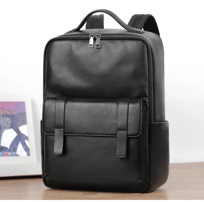Men's black leather computer backpack with woven design and large capacity