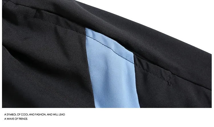 Men's black quick-drying sports shorts with elastic waistband and loose fit