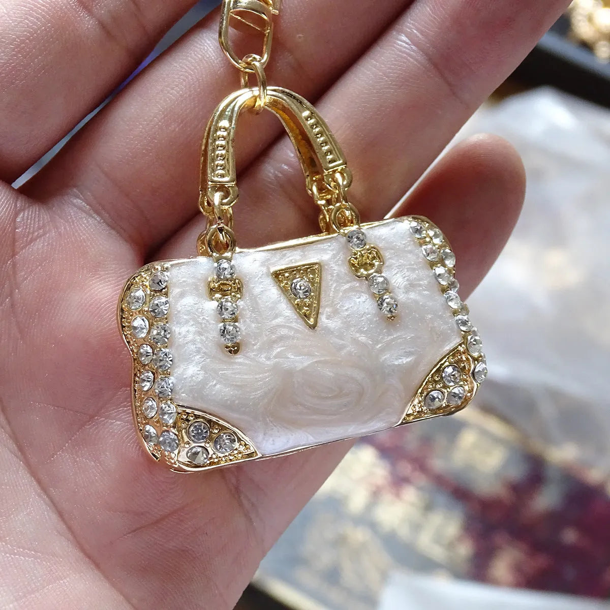 Alloy pendant keychain with enamel diamond cloud pattern in gold colour on keyring