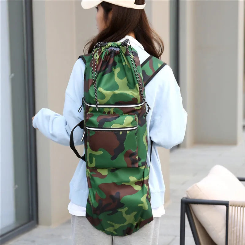 Black waterproof nylon skateboard bag holding a longboard, with yoga mat and fishing rod alternative uses shown.