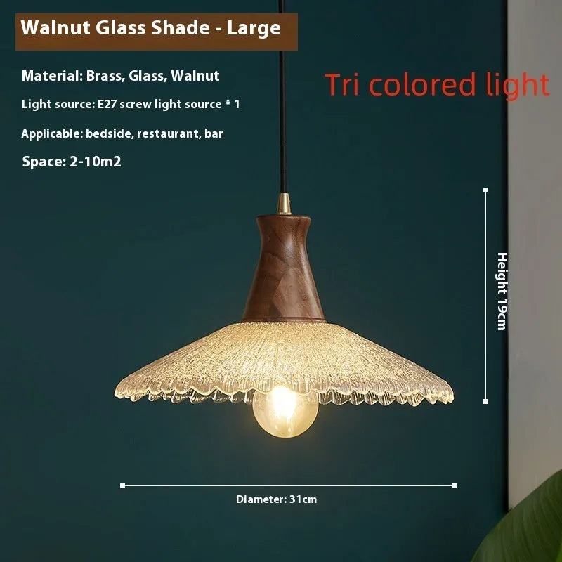 Brass-toned wood and glass chandelier with a retro design for ceiling mounting.