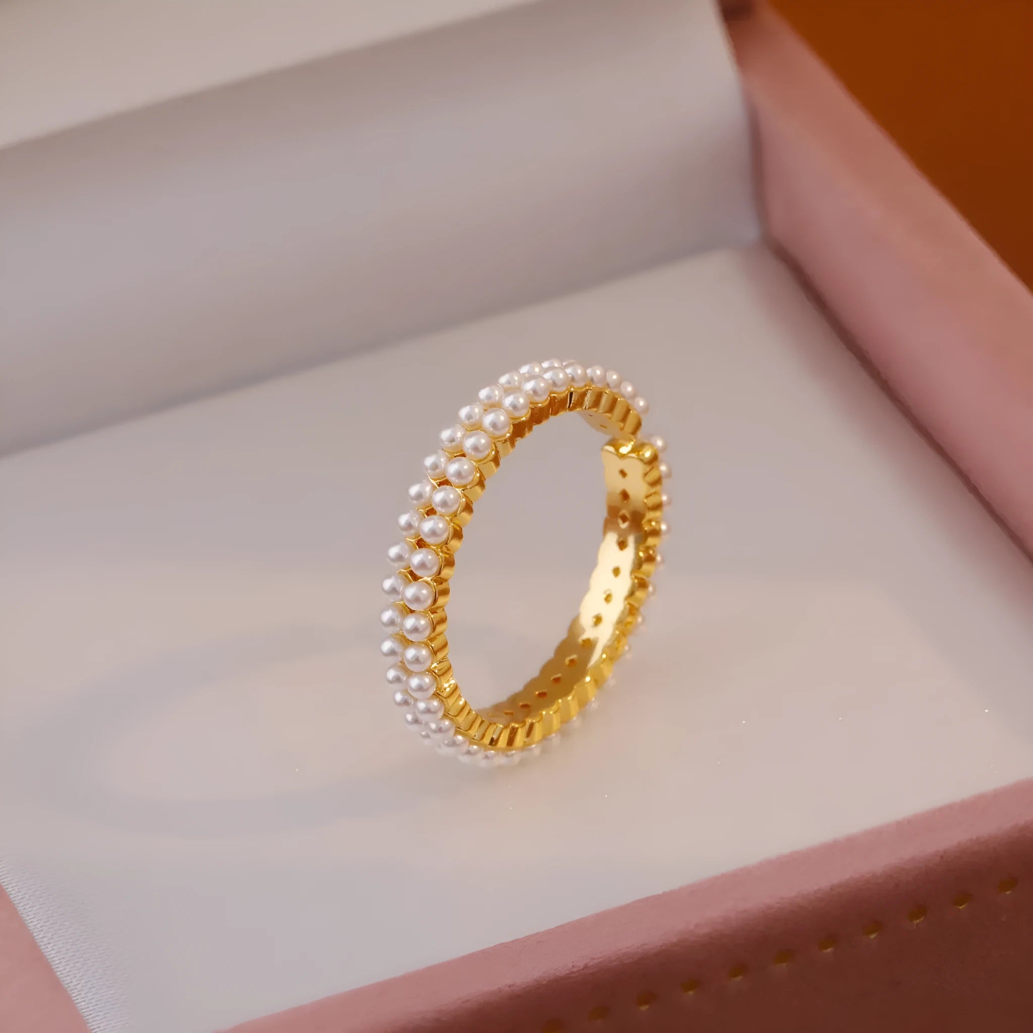 Gold geometric women's ring with open mouth adjustable design and single pearl accent on copper base